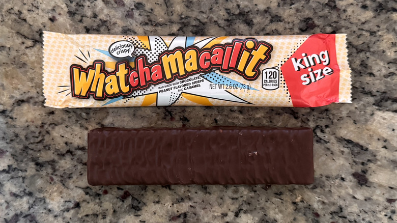 whatchamacallit candy bar on counter beside wrapper