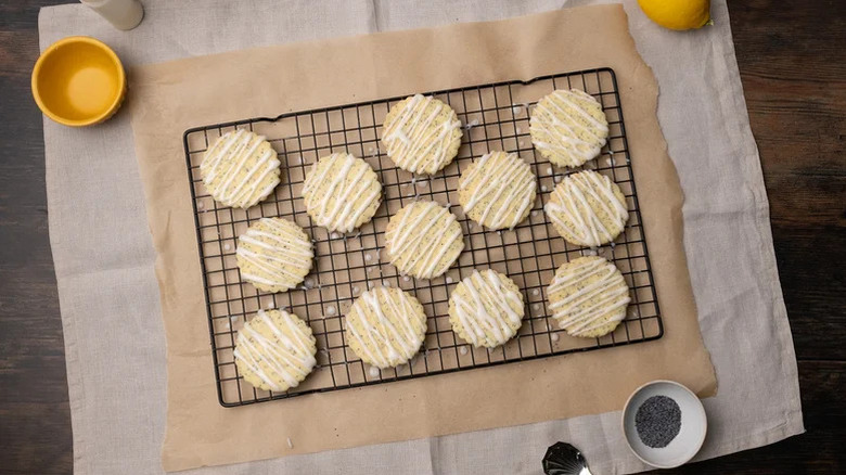 View of lemon poppy seed cookies on a rack