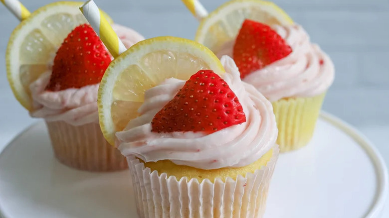 Close up of strawberry lemon cupcakes with fruit topping