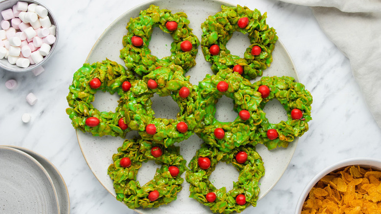 Red and green Christmas wreath cornflake cookies on plate