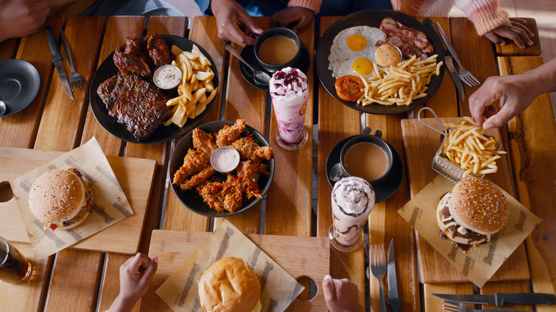 people eating variety of food