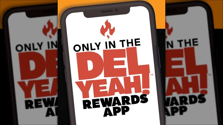 Mobile phone that says "Only in the Del Yeah! Rewards App"