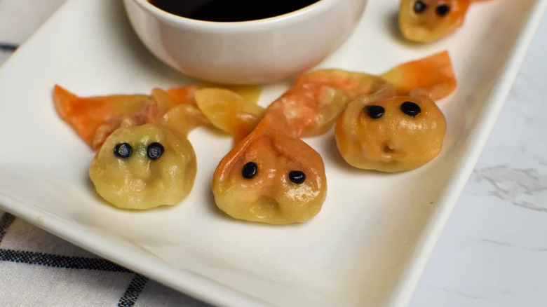 Goldfish Dumplings on rectangular white plate
