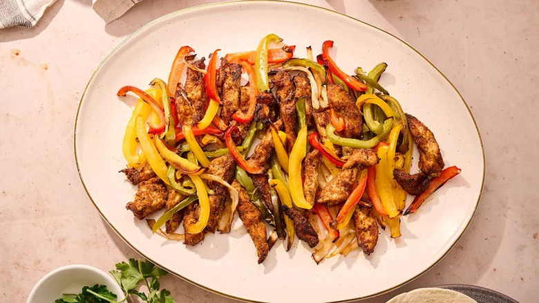 Air Fryer Chicken Fajitas on white serving plate