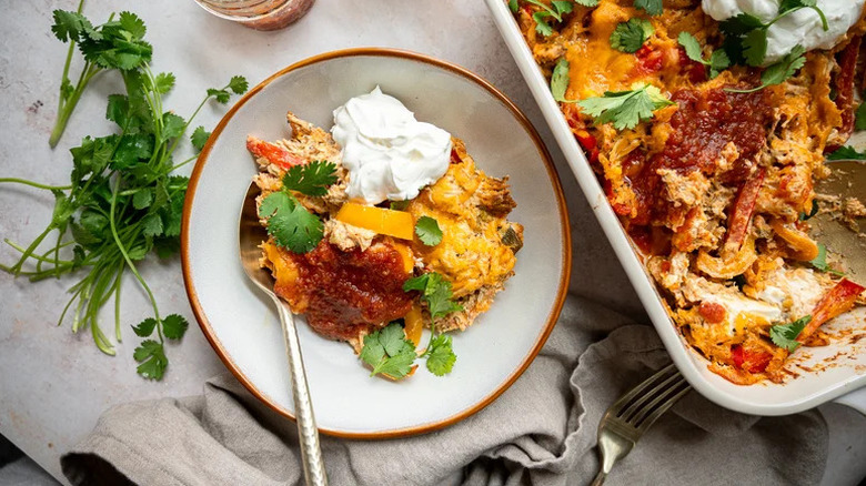 Chicken Fajita Casserole in white bowl and casserole dish