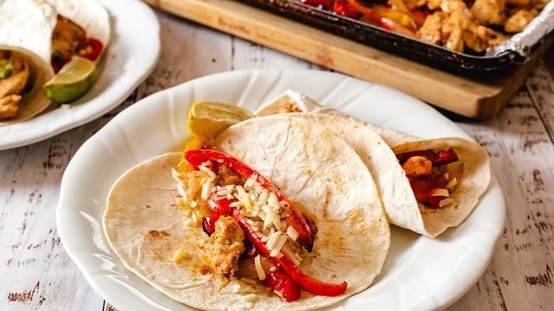 Sheet Pan Chicken Fajitas on white plate