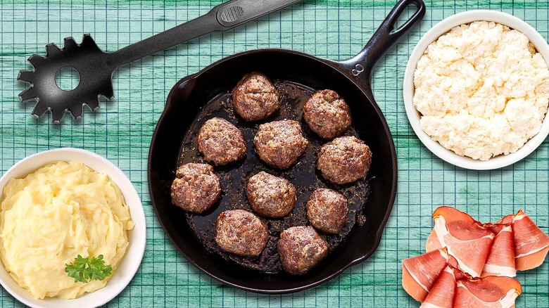 Meatballs with ingredients on background