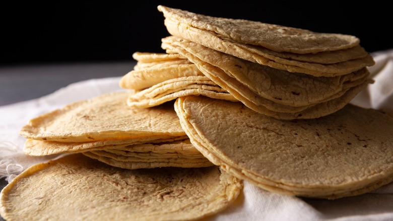 Stacked tortillas on cloth