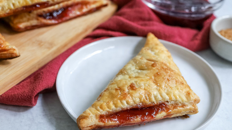 Cherry turnover on white plate