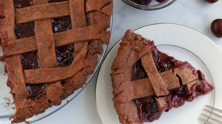 Chocolate cherry pie served onto plate