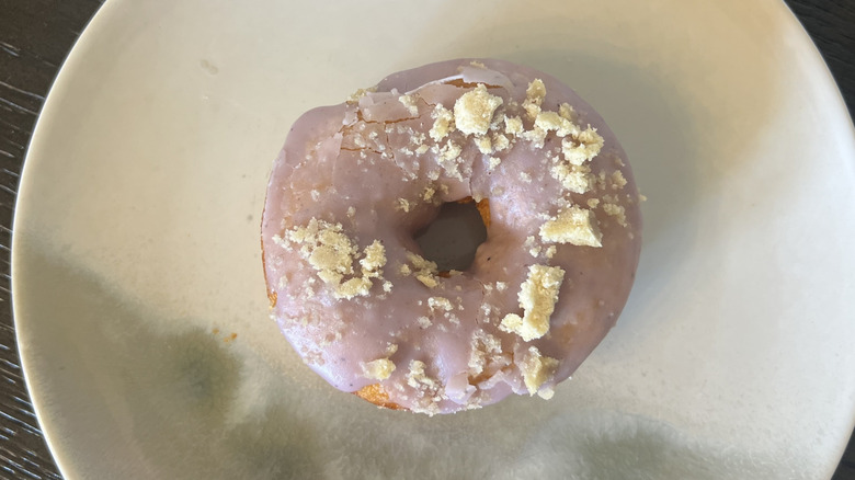 Duck Donuts Blueberry Streusel donut on plate.