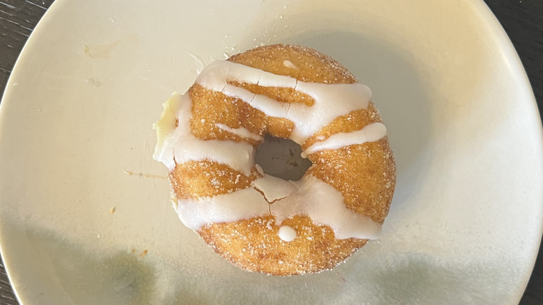 Duck Donuts Cinnamon Bun donut on plate.