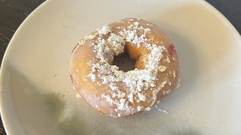 Duck Donuts Coffee Cake donut on plate.