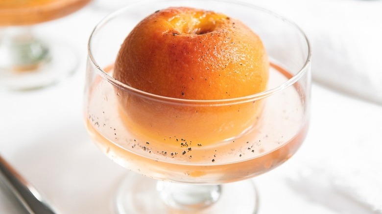 Poached peach in dessert glass