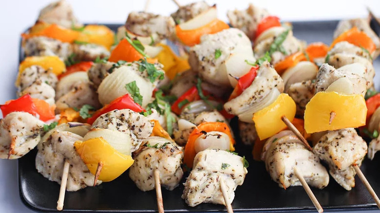 Easy Chicken Kabobs on black plate