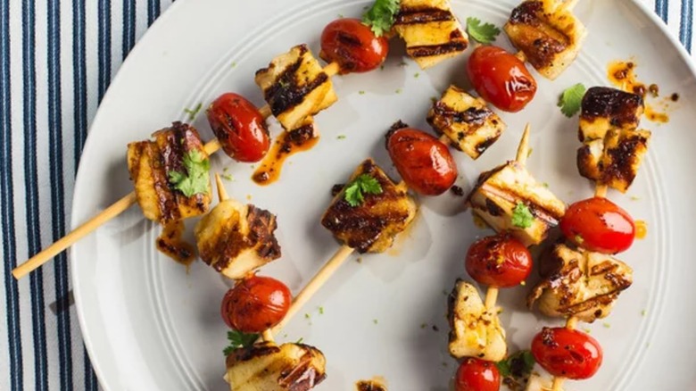 Grilled Halloumi-and-Tomato Skewers on white plate