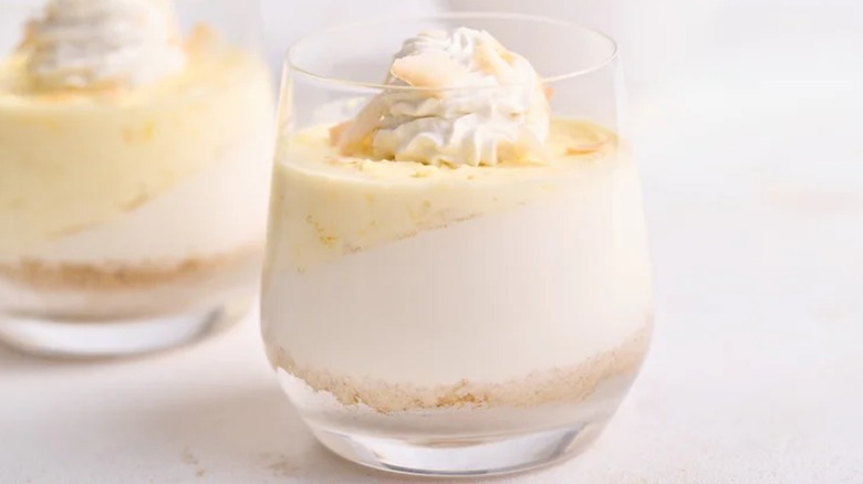 A close-up of elevated coconut lush in a stemless glass