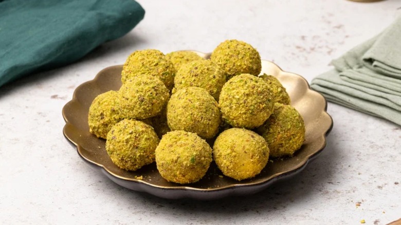 Pistachio truffles in a dish