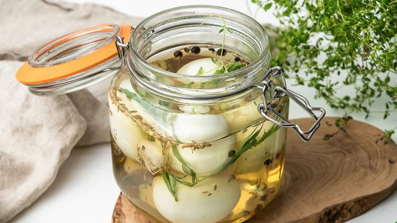 Herby Pickled Eggs in glass jar