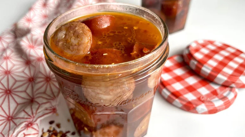 Vibrant Pickled Hot Dogs in glass jar