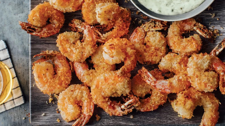 Easy Air Fryer Coconut Shrimp on wooden board