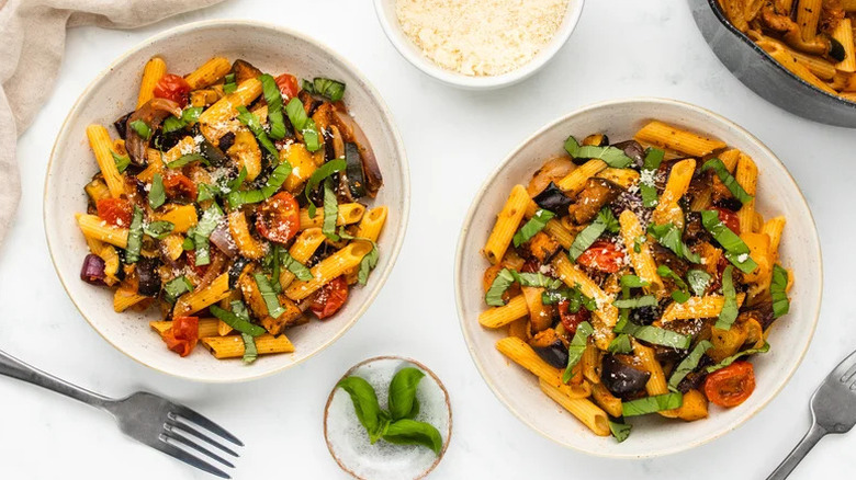 Oven-Roasted Ratatouille Pasta in two white bowls on table