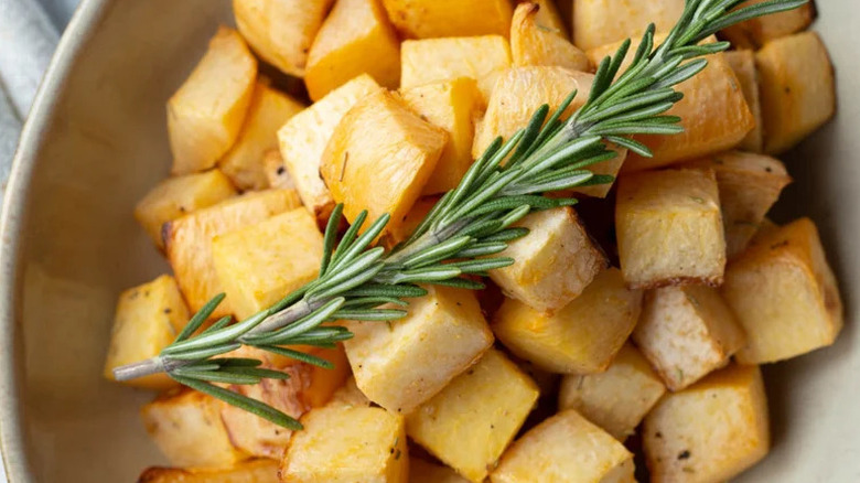 Simple Roasted Rutabaga with a sprig of rosemary