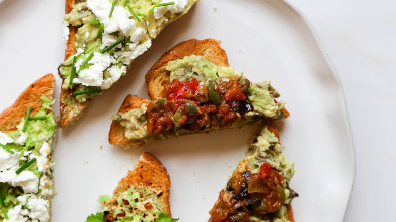 Avocado Toast slices on white plate