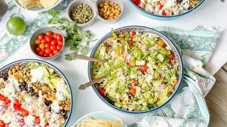 Mexican-Inspired Tuna Salad in large blue bowl on towel