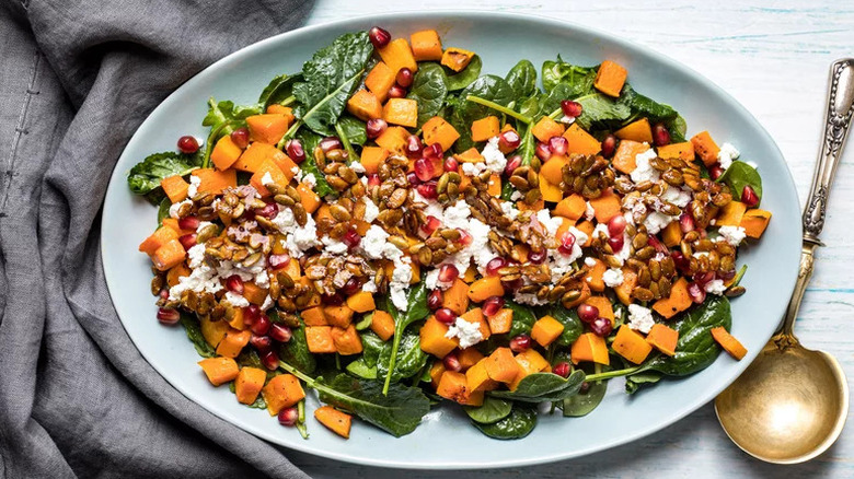 Roasted Butternut Squash Salad on blue serving platter