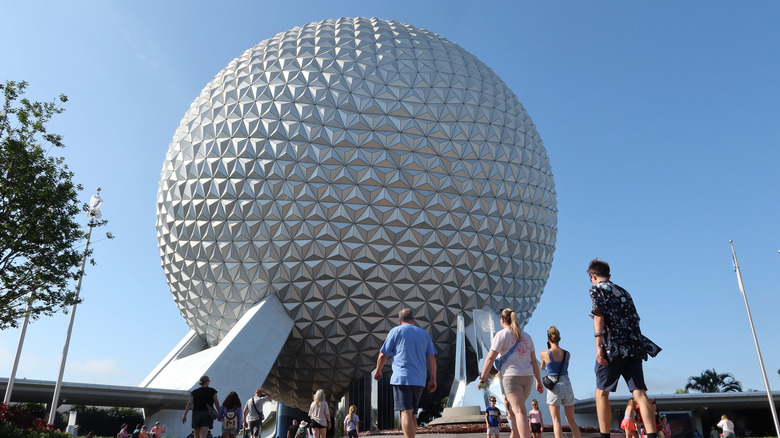 People walking towards Epcot sphere
