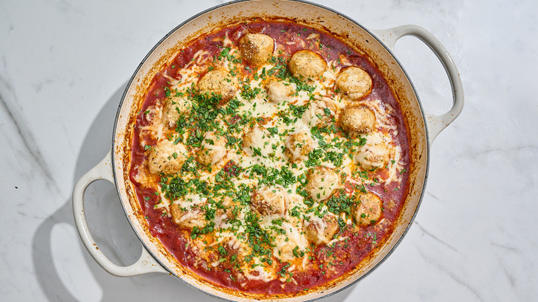 Cheesy chicken Parmesan meatballs in casserole pot