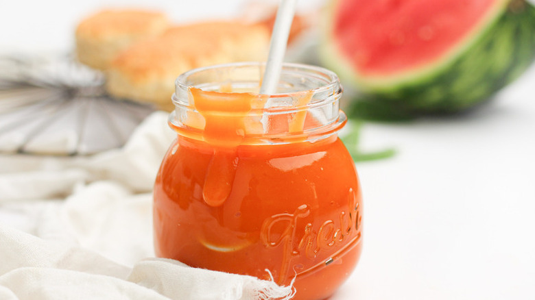 Watermelon curd in glass jar