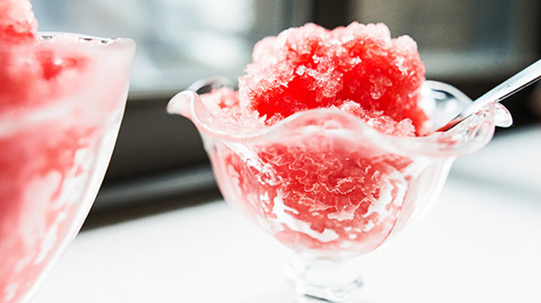 Watermelon granita in dessert glass with spoon