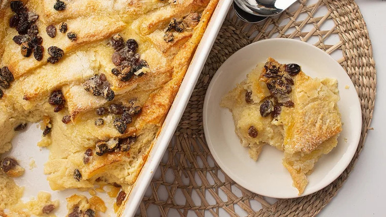 Irish Bread and Butter Pudding in white baking dish and on white plate