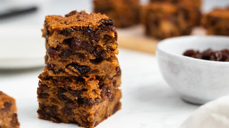 Rich Bread Pudding stacked on wooden table
