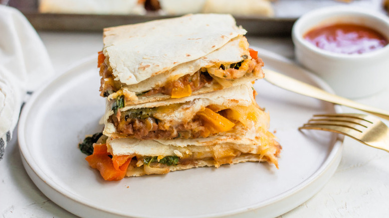 Stack of quesadillas on plate