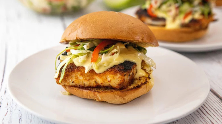Classic Blackened Fish Sandwich on white plate