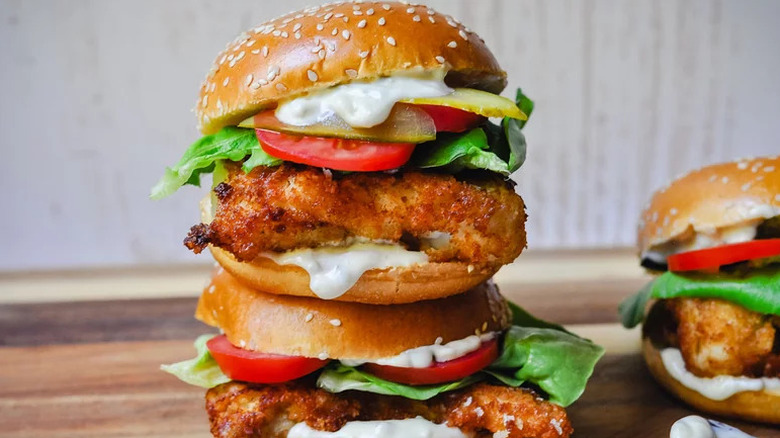 Fried Cod Sandwiches stacked on top of one another