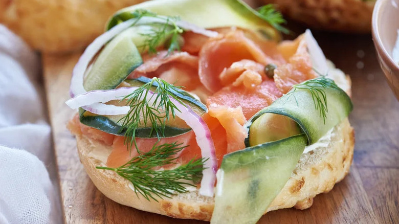 Loaded Lox Bagel on wooden board