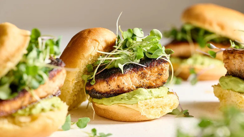 Salmon Sliders with Avocado Crema with microgreens
