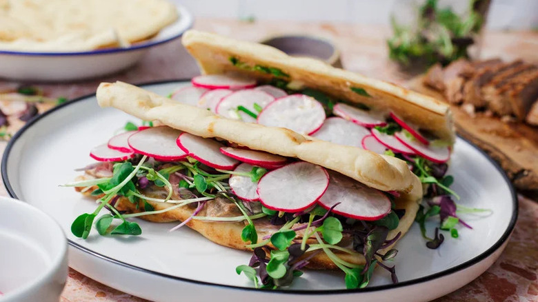 Seared Ahi Tuna Flatbread Sandwiches on white plate