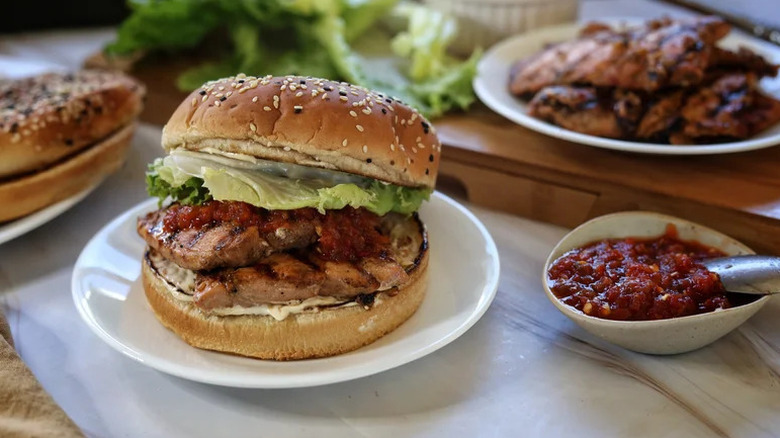 Sweet and Spicy Grilled Salmon Sandwiches on white plate