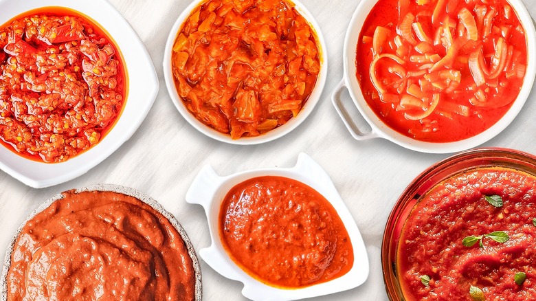 six red sauces in bowls 