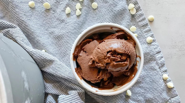 Vegan Chocolate Ice Cream in white bowl on striped towel