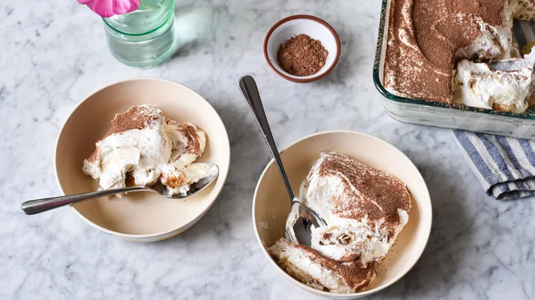 Vegan-Friendly Tiramisu in two beige bowls with spoons