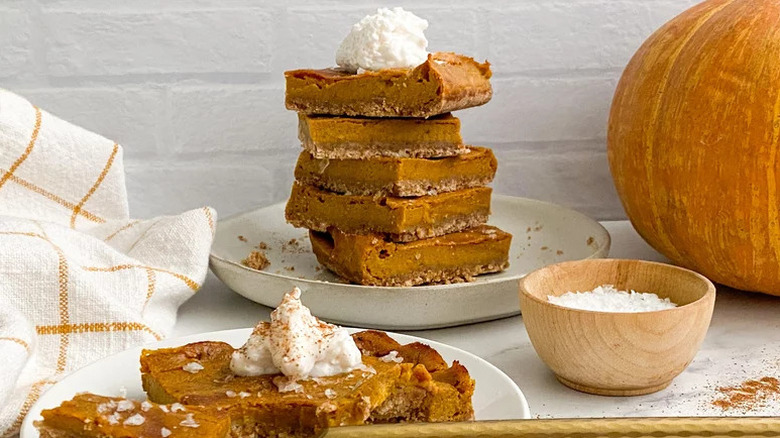 Vegan Pumpkin Bars stacked on white plate