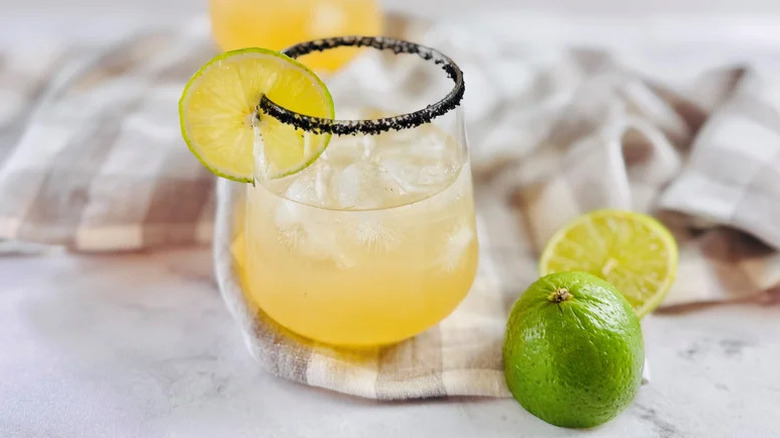 Copycat Texas Roadhouse Legend Margarita in glass on kitchen towel
