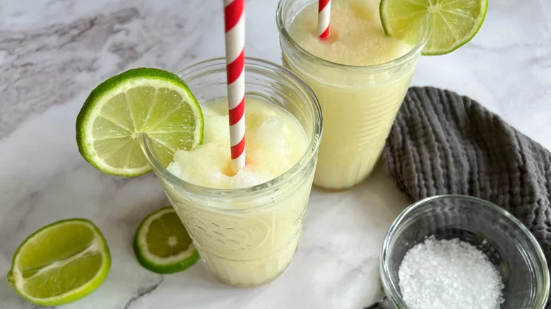 Margarita Mocktails in glass jars with colorful straws