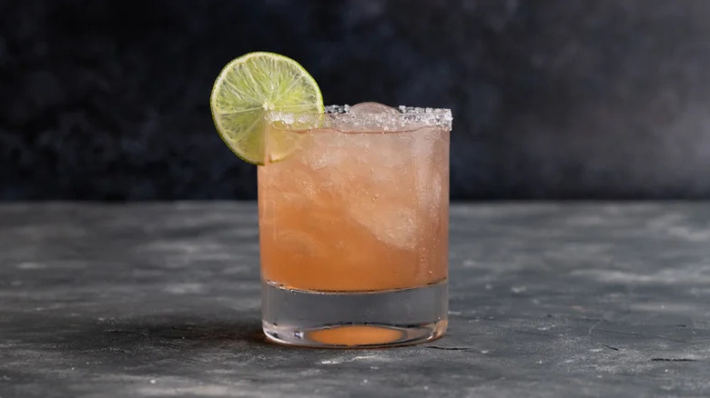 Prickly Pear Margarita with lime slice garnish